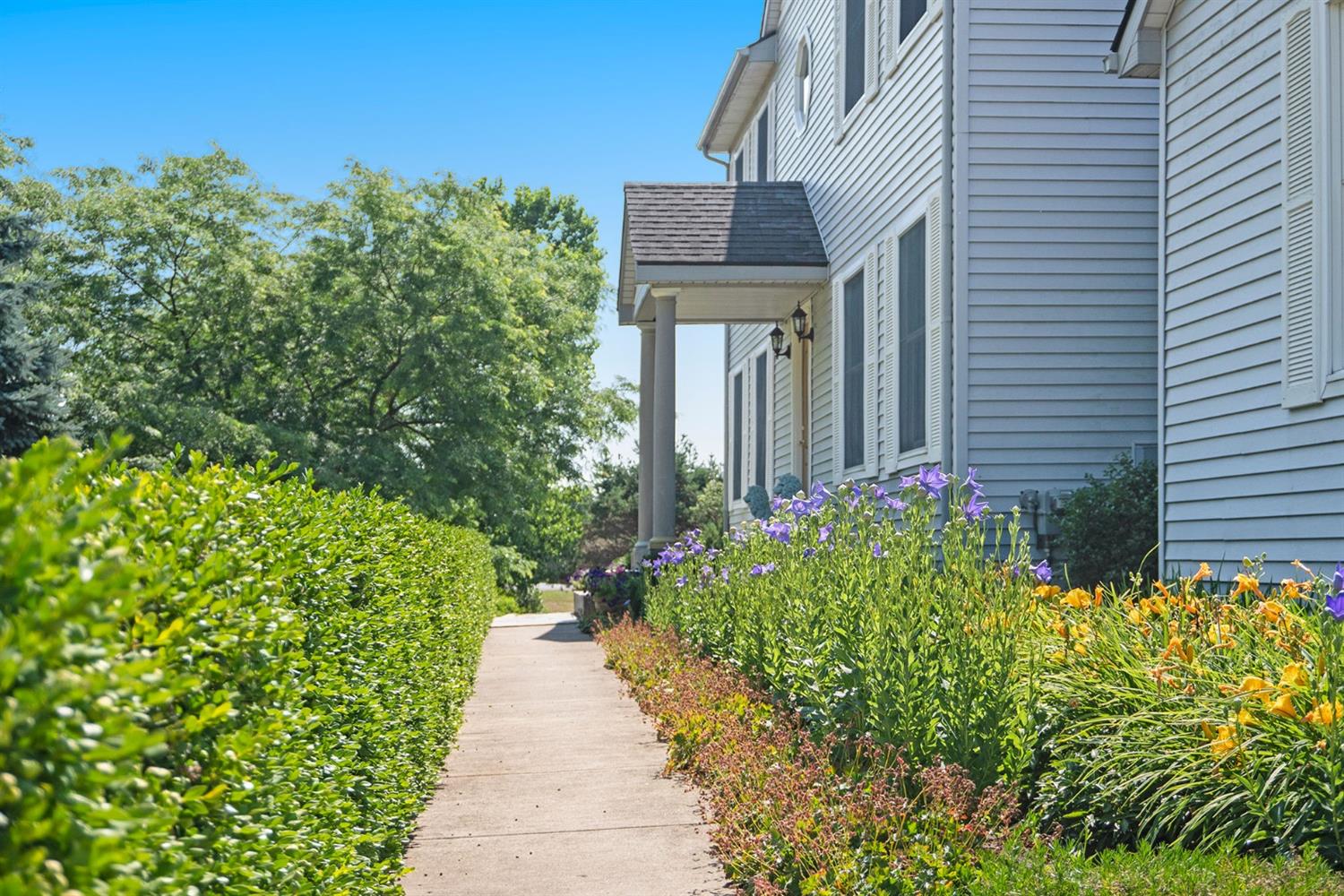 Impeccable Two Story with Fabulous Grounds